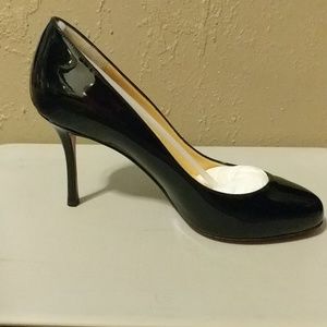 Christian Louboutin black patent pumps